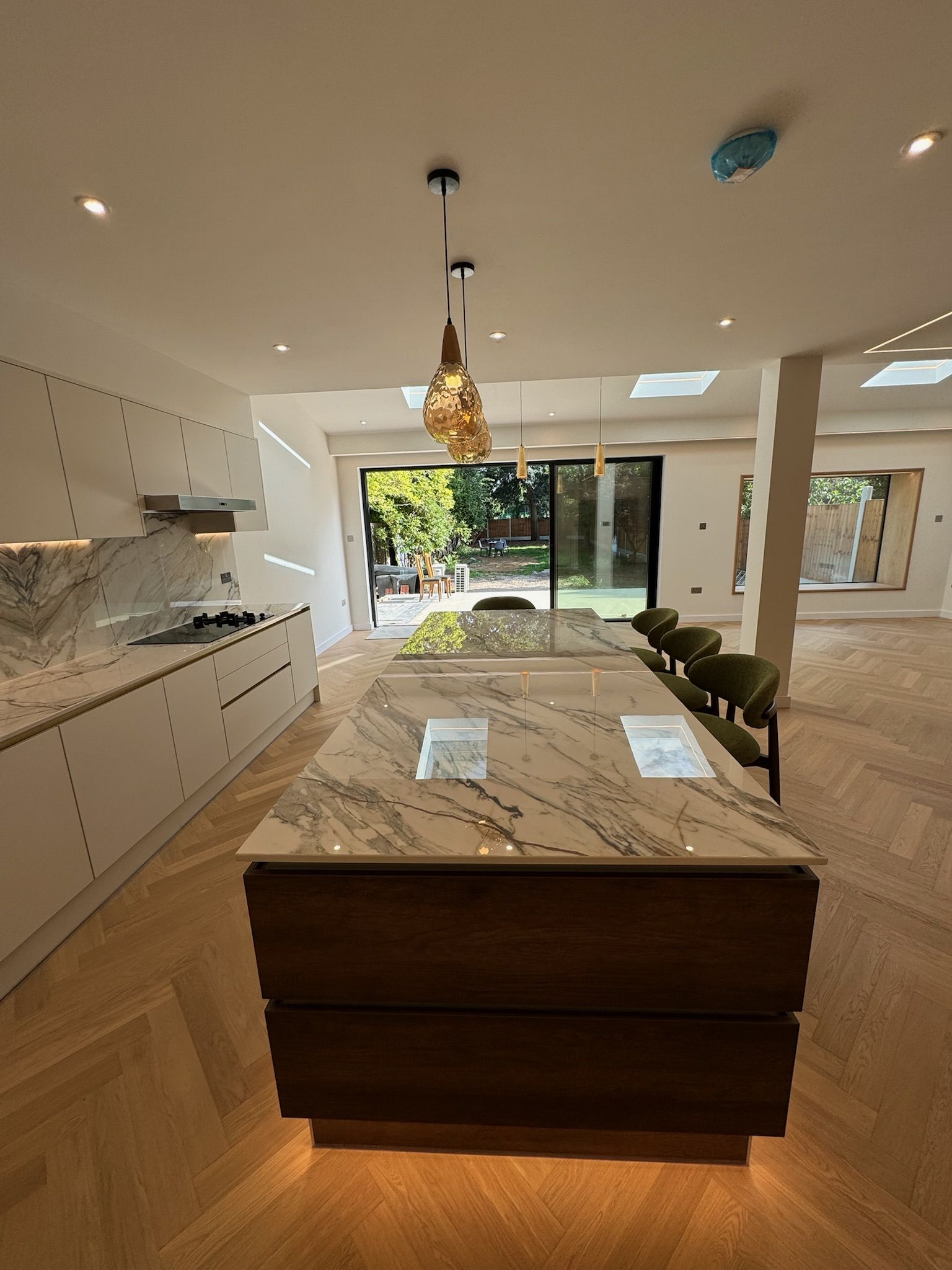 Dunstan Road Golders Green — kitchen with garden view after renovation by Alstruct Ltd