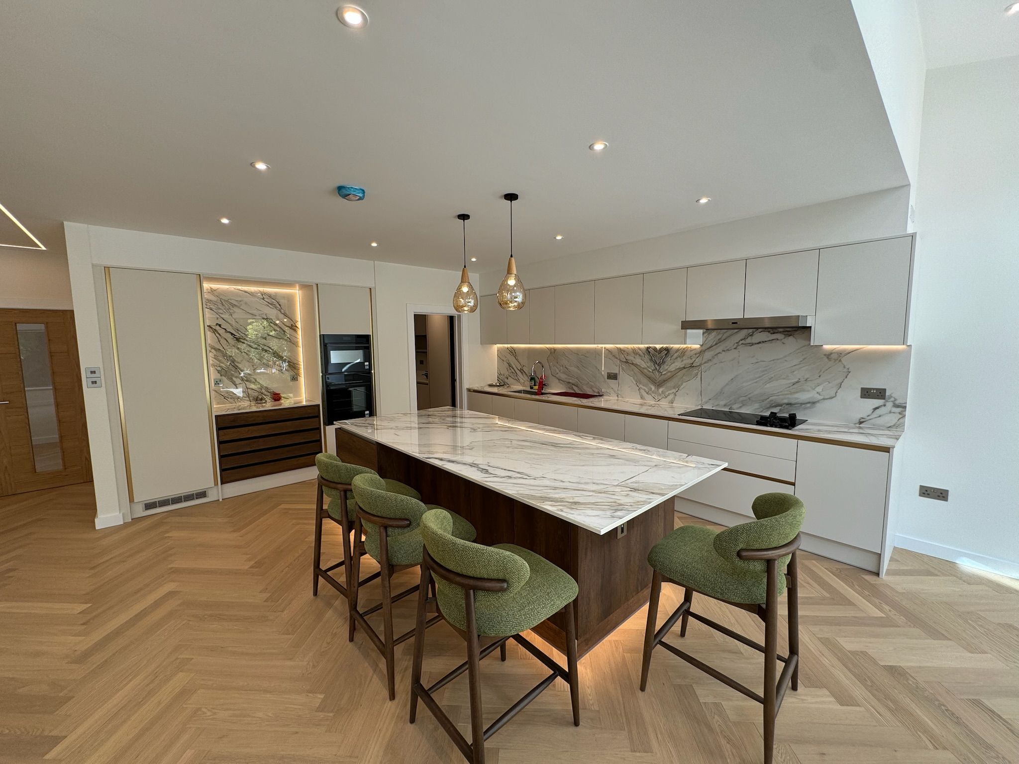 Dunstan Road Golders Green — kitchen with marble island in extended rear space