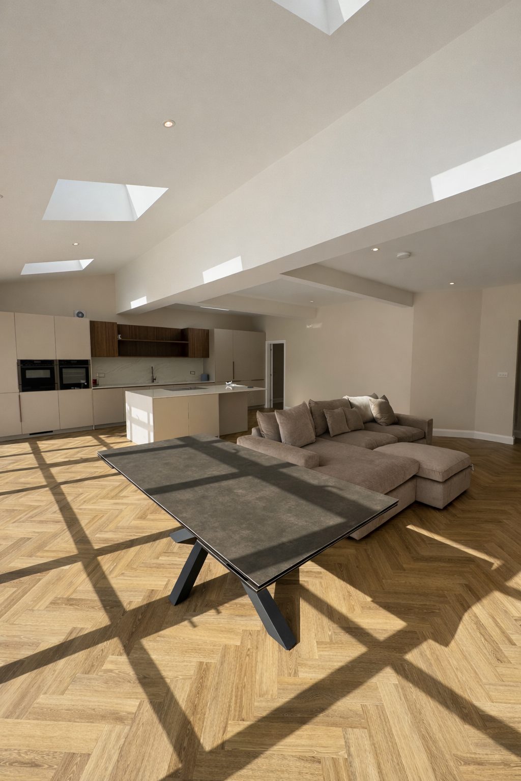 Cockfosters open-plan kitchen with skylights — Evelyn Road renovation by Alstruct Ltd