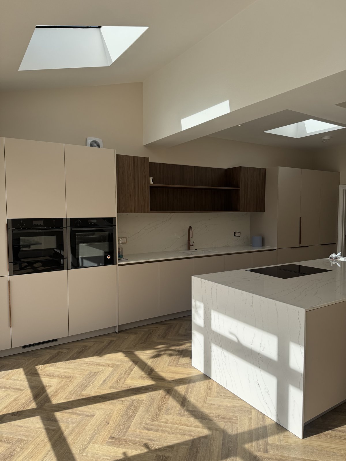 Evelyn Road Cockfosters — new kitchen with marble island in extended rear space