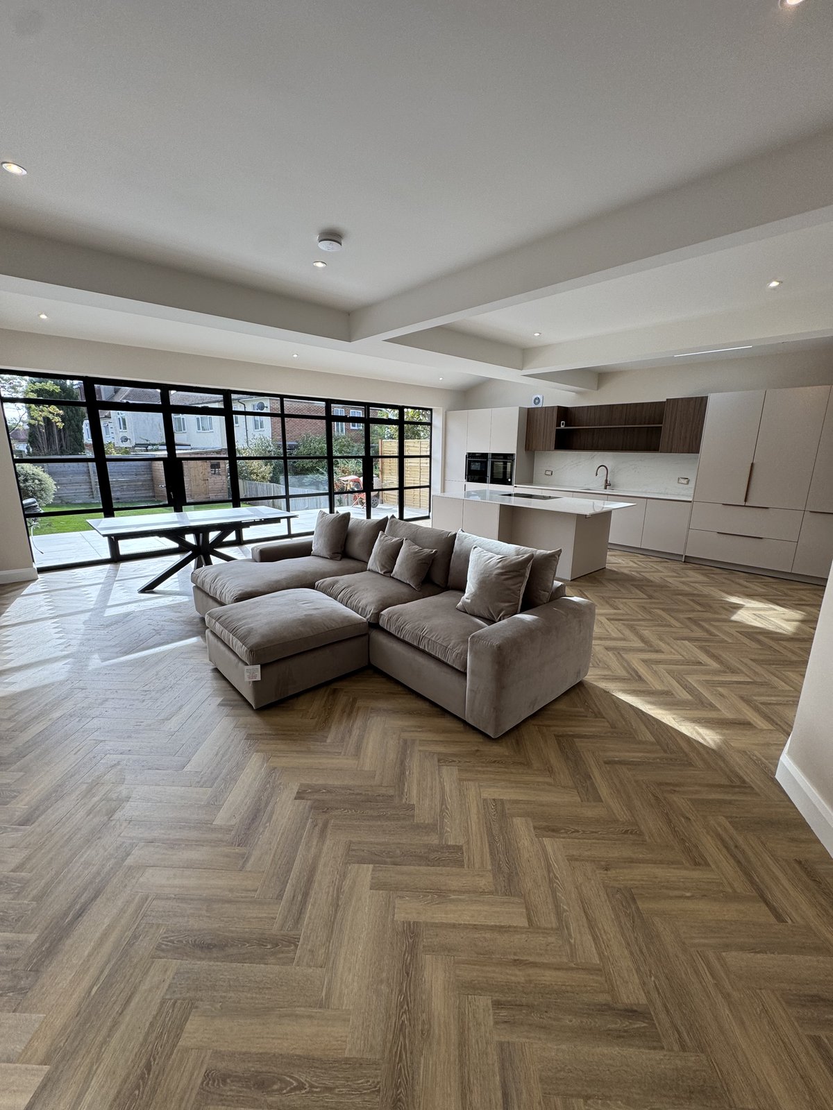 Open-plan living space created by removing a load-bearing wall in a London home