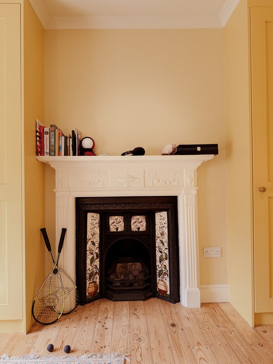 Limehouse Cottage: restored period fireplace with tiled insert
