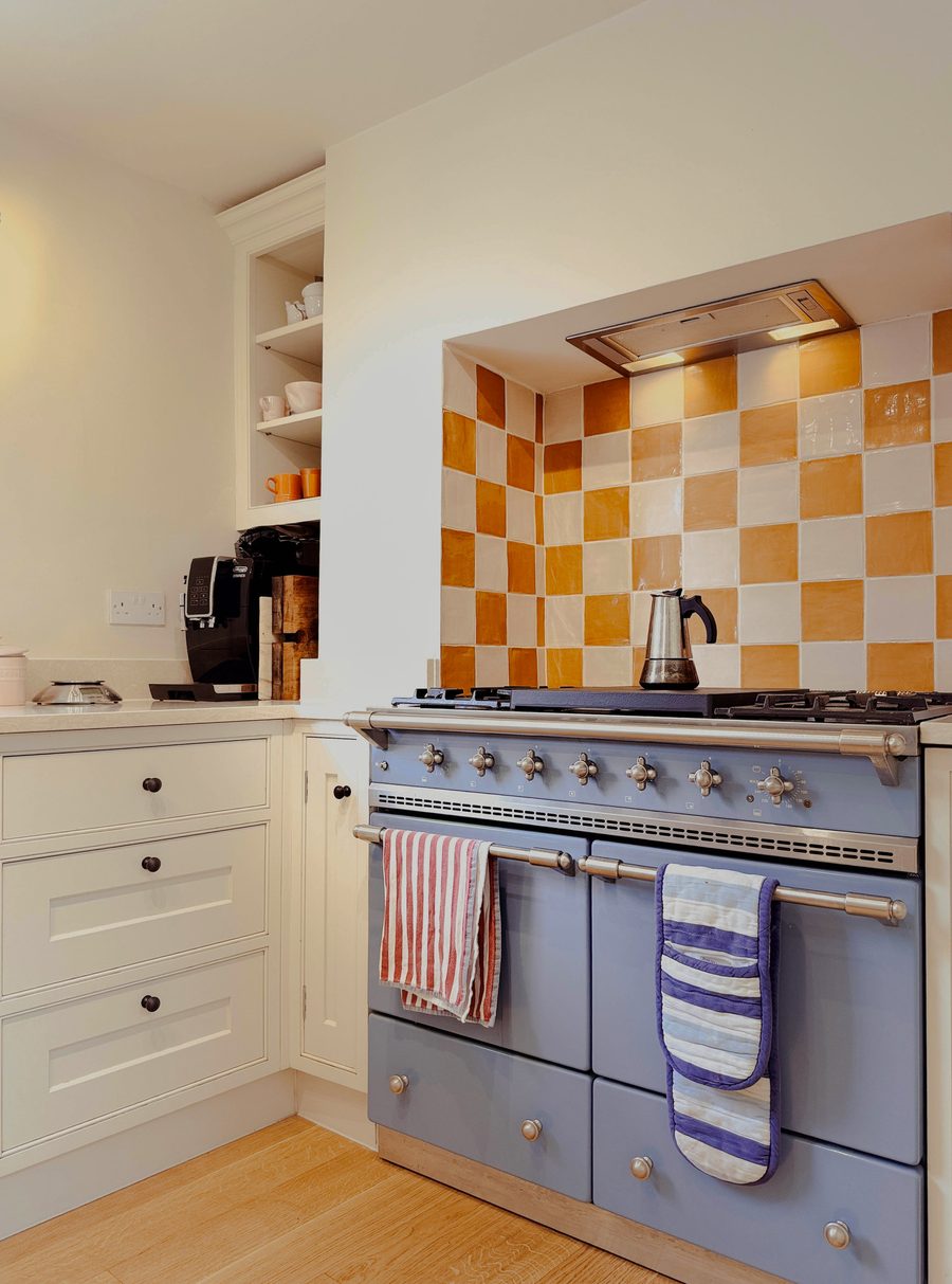 Limehouse Cottage: Lacanche range cooker and chequerboard tiles in the new kitchen