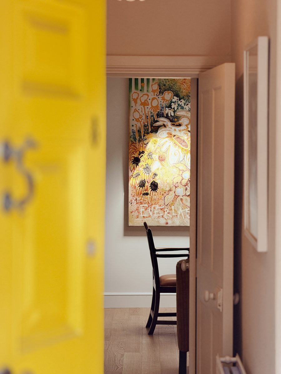 Limehouse Cottage: yellow painted front door and hallway