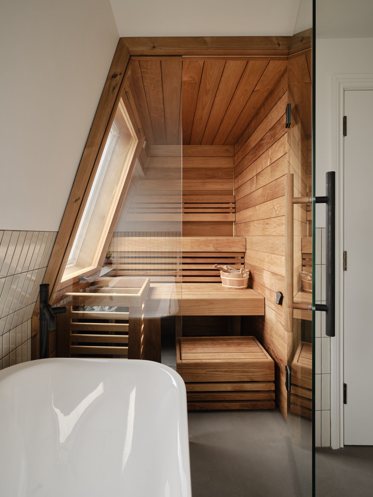 Whitehall Park Archway — bespoke loft sauna with cedar lining and skylight
