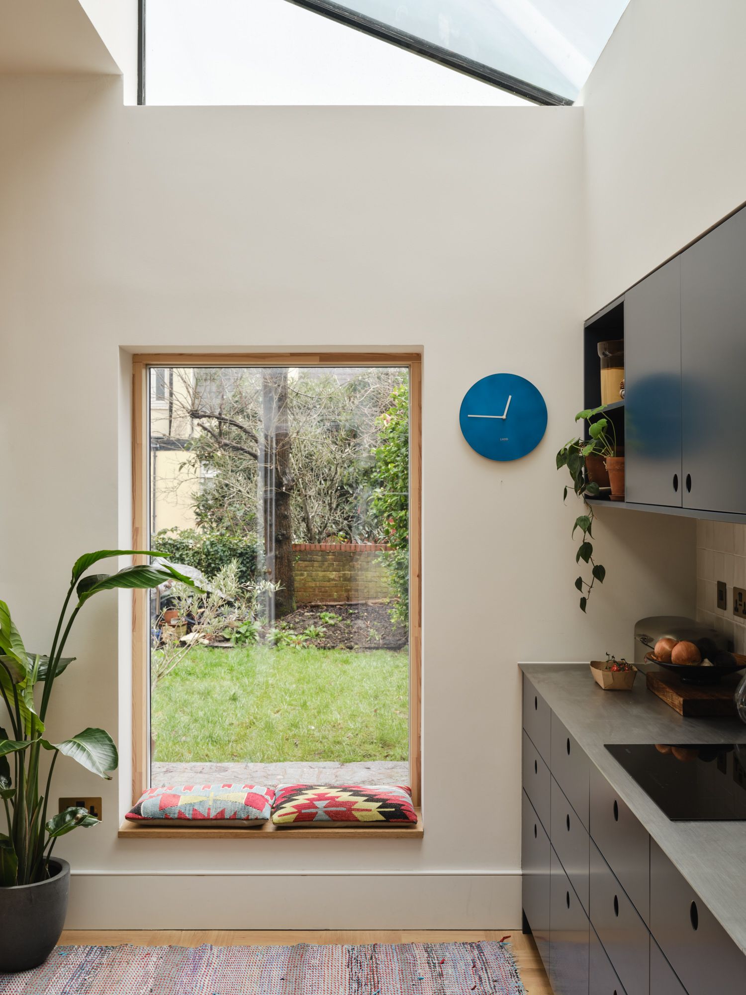 Whitehall Park Archway — bespoke window seat in kitchen extension with garden outlook